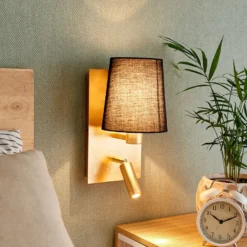 Aplique de pared Aiden de Lindby, 30 cm, negro, dorado, brazo de lectura LED