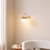 Aplique de pared Anemon, color dorado, altura 29 cm, metal/vidrio, E14