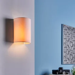 Aplique de pared Annalisa de Lindby, altura 20 cm, blanco, textil