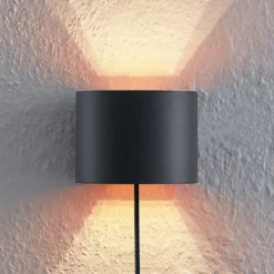 Aplique de pared Arcchio Zuzana, redondo, negro, enchufe, 13 cm