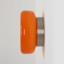 Aplique de pared BonBon, naranja, Ø 16 cm, cristal