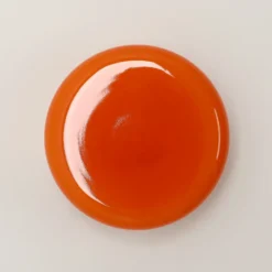 Aplique de pared BonBon, naranja, Ø 16 cm, cristal