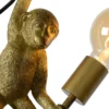 Aplique de pared Extravaganza Chimp, dorado mate/negro