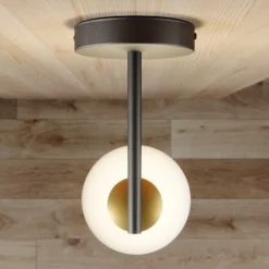 Aplique de pared Gama en negro con bola de cristal
