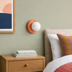 Aplique de pared Harriet de Lindby, naranja/blanco, cerámica, Ø 22 cm, G9
