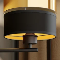 Aplique de pared Hilton negro/dorado con brazo de lectura LED