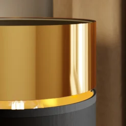 Aplique de pared Hilton negro/dorado con brazo de lectura LED