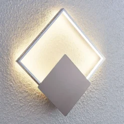 Aplique de pared LED Anays de Lindby, 32 cm x 32 cm, cromo/claro