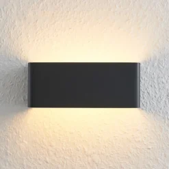 Aplique de pared LED Arcchio Karam, 20 cm, negro, metal, arriba/abajo