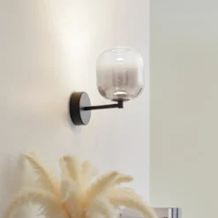 Aplique de pared LED Avelina de Lucande, gris humo