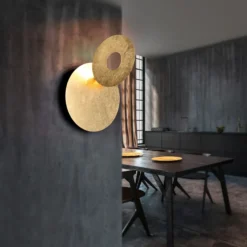 Aplique de pared LED Leano, lente redonda, dorado, indirecto
