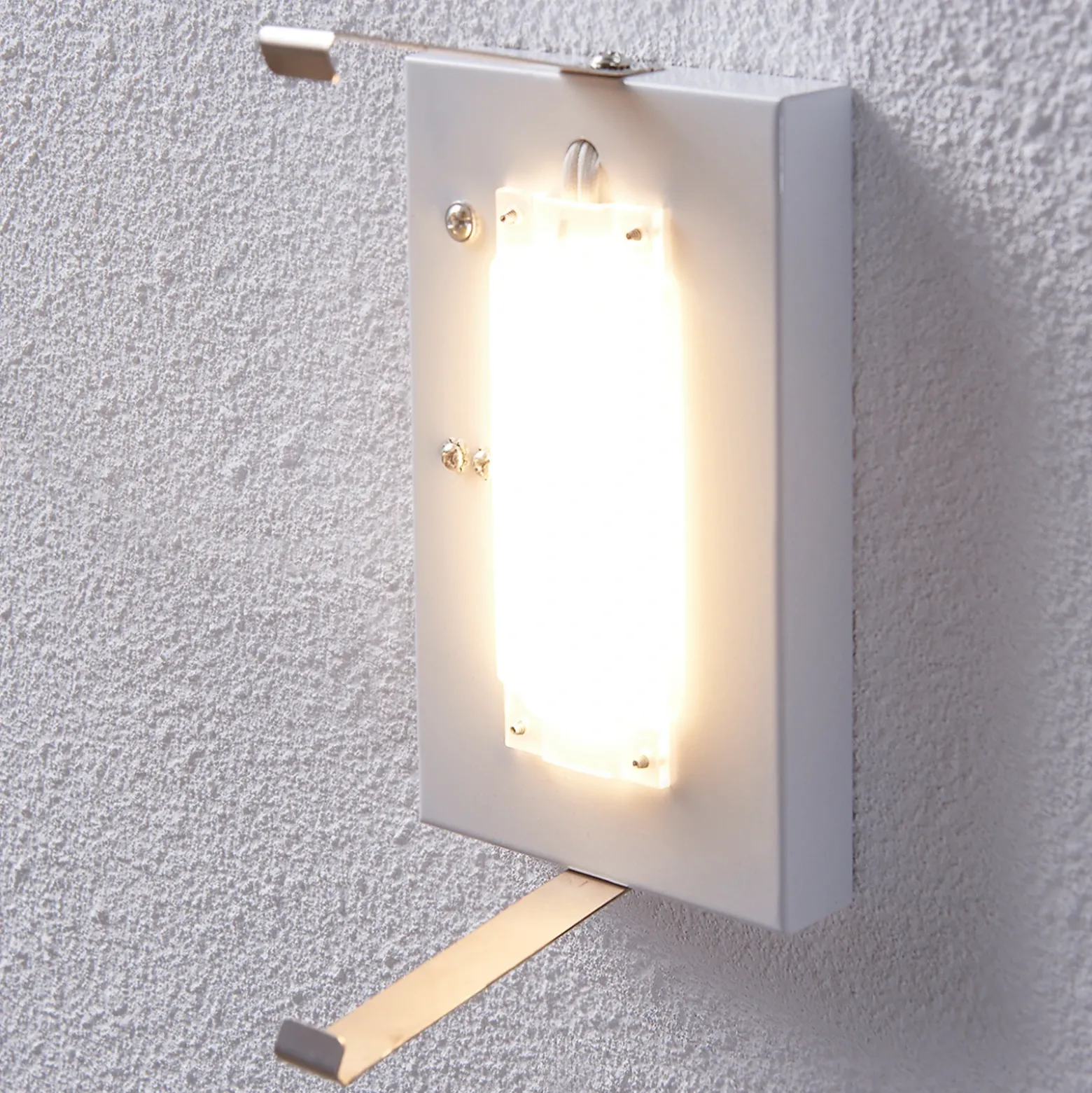 Aplique de pared LED Lindby Helmi, altura 21 cm, cristal, semicircular