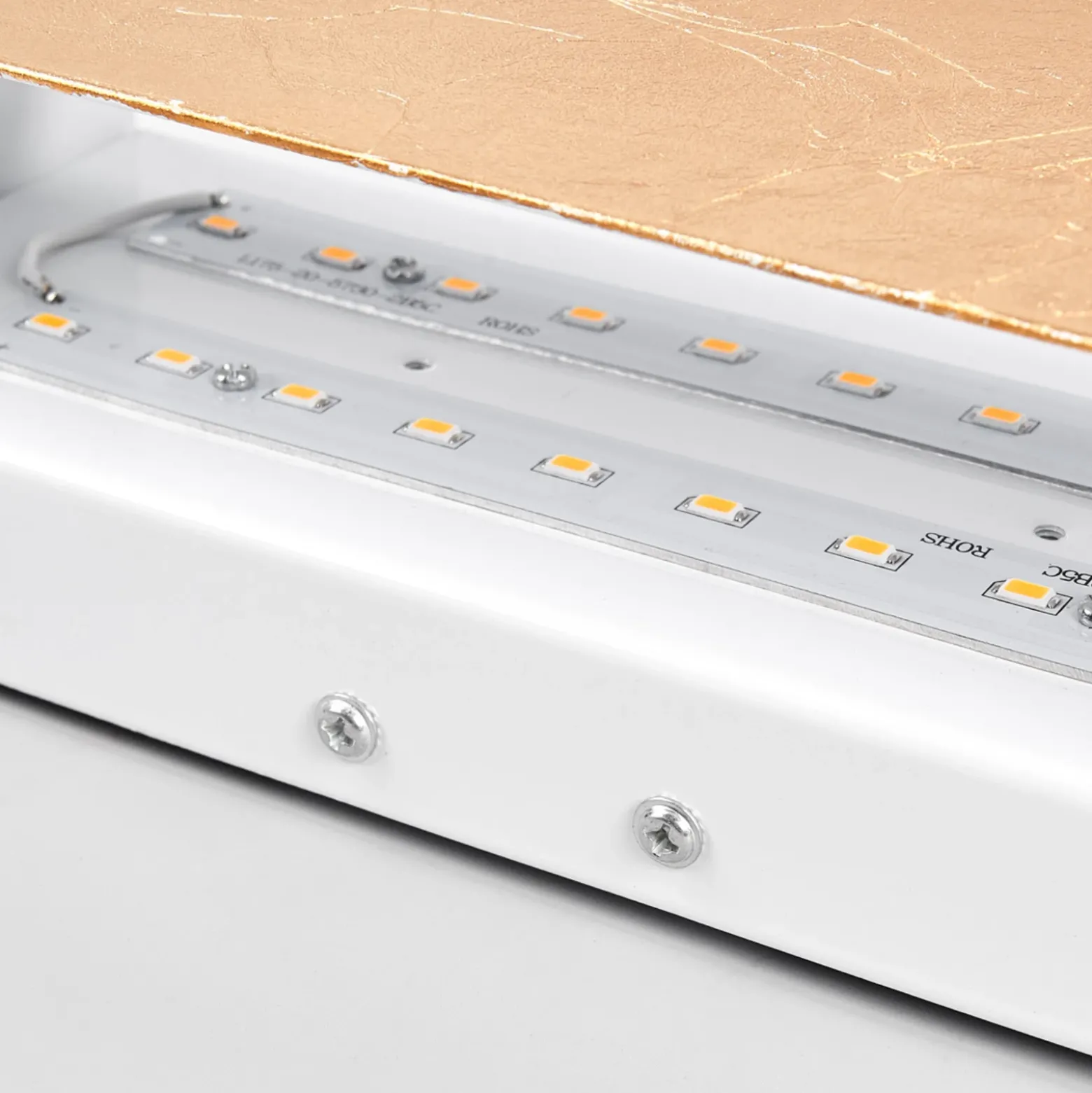 Aplique de pared LED Quentin de Lindby, 23 cm de ancho, color dorado, metal