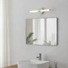 Aplique de pared LED Ramola, color cromado, ancho 45 cm, IP44, CCT