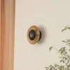 Aplique de pared LED Tiama de Lindby, metal, negro/oro, Ø 20 cm