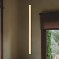 Aplique de pared LED Vibia SPA, longitud 121 cm, beige, IP44 2700 K