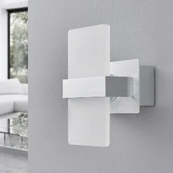Aplique de pared LED Yorick de Lindby, 18 cm, aluminio/blanco con interruptor