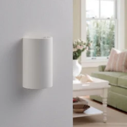 Aplique de pared Lindby Colja, redondo, altura 16 cm, escayola, blanco