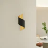 Aplique de pared Lindby Desirio, negro/oro, 24cm, metal