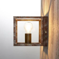 Aplique de pared Lindby Emin, ancho 18 cm, color óxido, metal