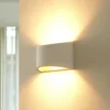 Aplique de pared Lindby Heiko, arriba/abajo, escayola, blanco, altura 12 cm