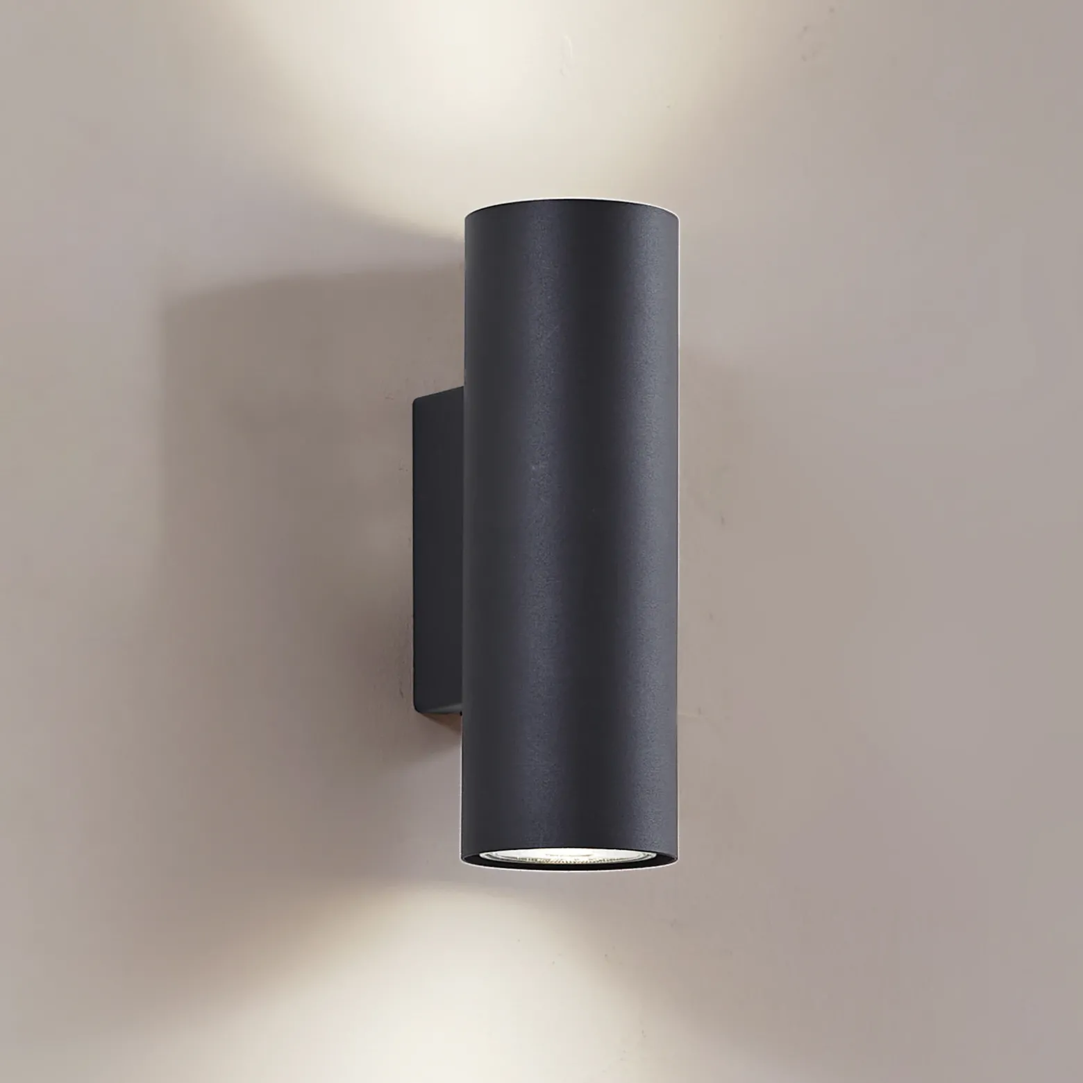 Aplique de pared Lindby Joffrey, 18 cm, negro, arriba/abajo, GU10