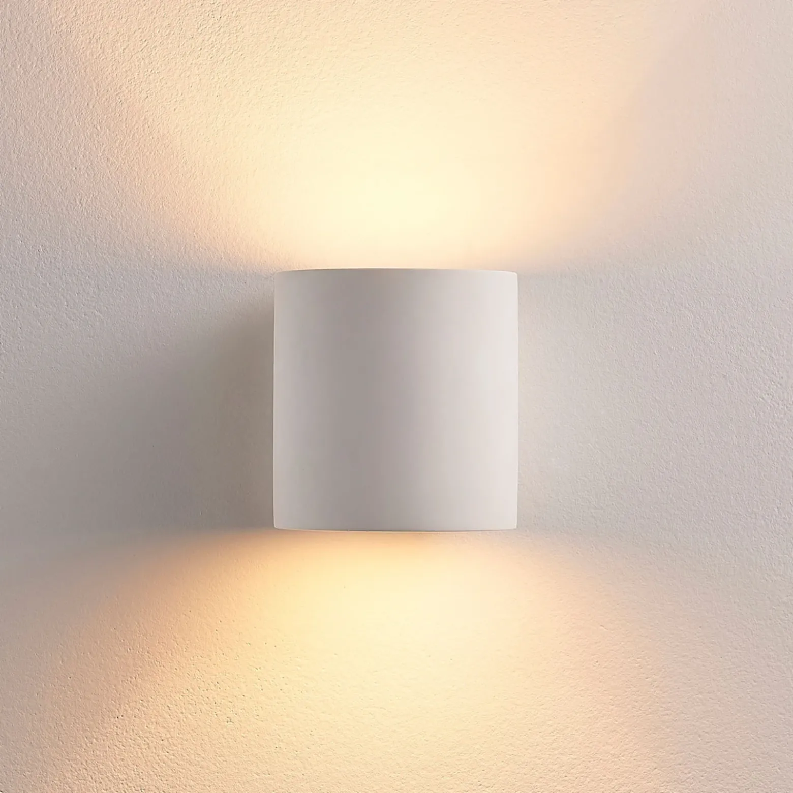 Aplique de pared Lindby Krista, blanco, escayola, arriba/abajo, pintable, G9
