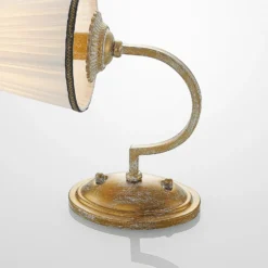 Aplique de pared Lindby Lumiel, crema/latón, textil, 27cm