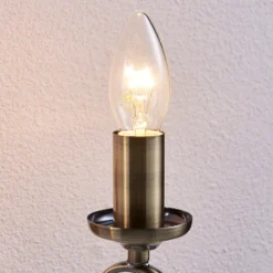 Aplique de pared Lindby Marnia, latón envejecido, 2 luces, 27 cm, E14