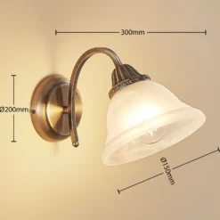 Aplique de pared Lindby Mialina, 20 cm, latón antiguo, metal, cristal
