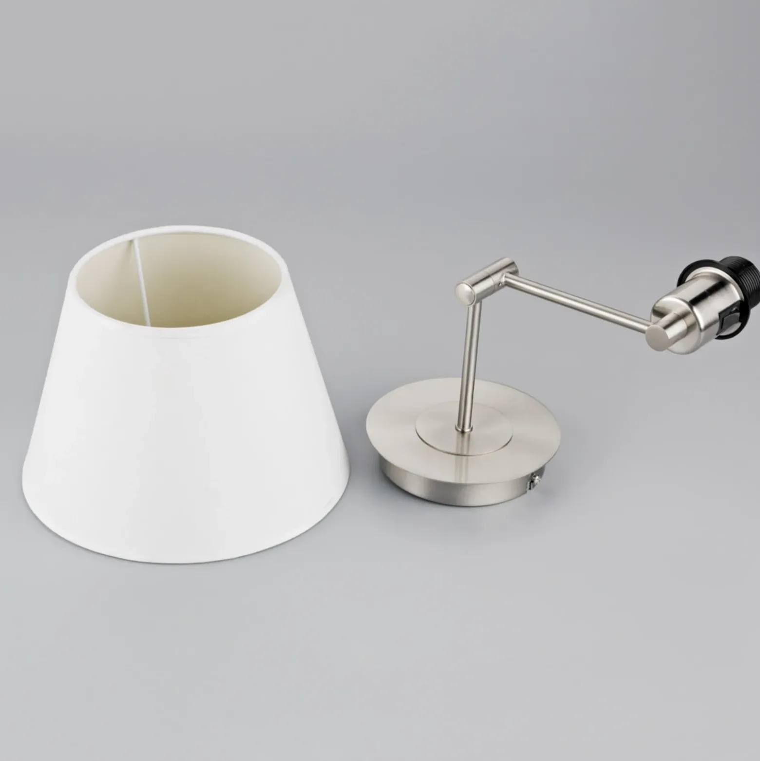Aplique de pared Lindby Pola, 30 cm, níquel, extensible, textil