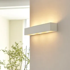 Aplique de pared Lindby Tjada, 51 cm, blanco, escayola, G9, pintable