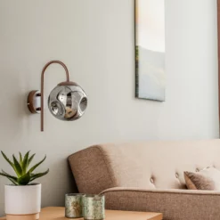 Aplique de pared Lindby Valentina, E14, gris humo, cristal, 28,6 cm