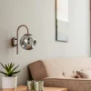 Aplique de pared Lindby Valentina, E14, gris humo, cristal, 28,6 cm