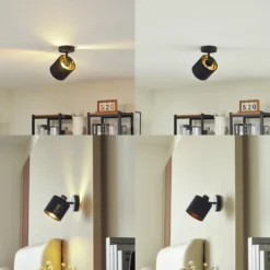 Aplique de pared Lindby Vasilia, Ø 12 cm, negro/oro, tela