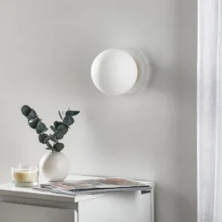 Aplique de pared Minerva K1, blanco, Ø 15 cm, vidrio/metal