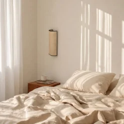 Aplique de pared Nature, yute/negro, altura 40 cm, tejido, luz hacia