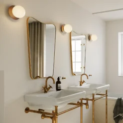 Aplique de pared Nuura Liila 1 Medium, bronce/ópal, IP44, G9