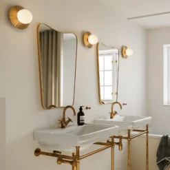 Aplique de pared Nuura Liila Muuse, Ø 20 cm, IP44, dorado/ópalo
