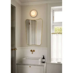Aplique de pared Nuura Liila Muuse, Ø 20 cm IP44, blanco/ópalo