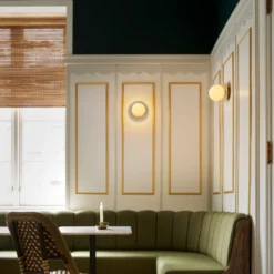 Aplique de pared Nuura Liila 1 Medium, dorado/amarillo miel, IP44, G9