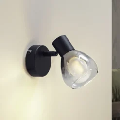 Aplique de pared Pendura de Lindby, Ø 9 cm, negro, cristal