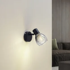 Aplique de pared Pendura de Lindby, Ø 9 cm, negro, cristal