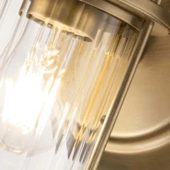 Aplique de pared Riggs IP44, latón envejecido, 1 luz