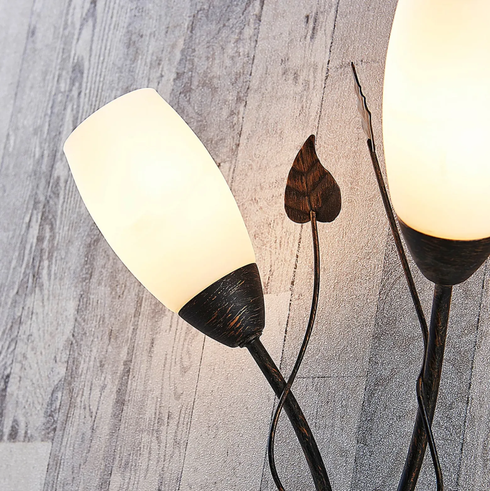 Aplique de pared Stefania de Lindby, negro/dorado, cristal, E14, 42,5 cm