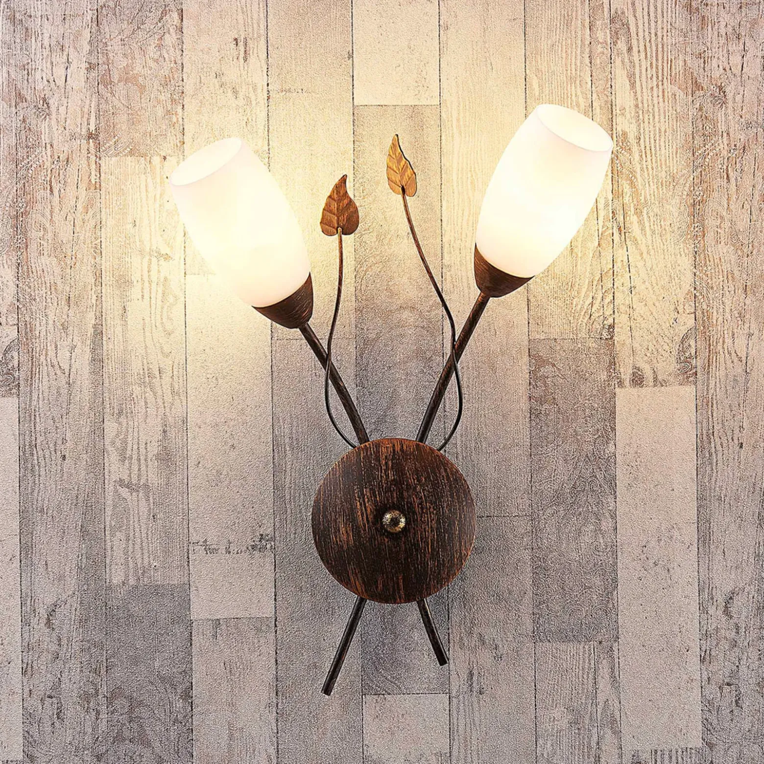 Aplique de pared Stefania de Lindby, negro/dorado, cristal, E14, 42,5 cm