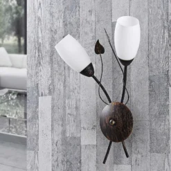 Aplique de pared Stefania de Lindby, negro/dorado, cristal, E14, 42,5 cm