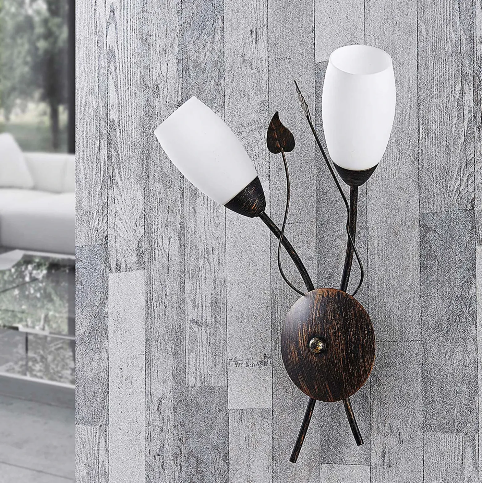 Aplique de pared Stefania de Lindby, negro/dorado, cristal, E14, 42,5 cm