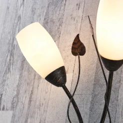 Aplique de pared Stefania de Lindby, negro/dorado, cristal, E14, 42,5 cm