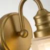 Aplique de pared Swell, color latón, cristal, 24 cm, IP44, G9